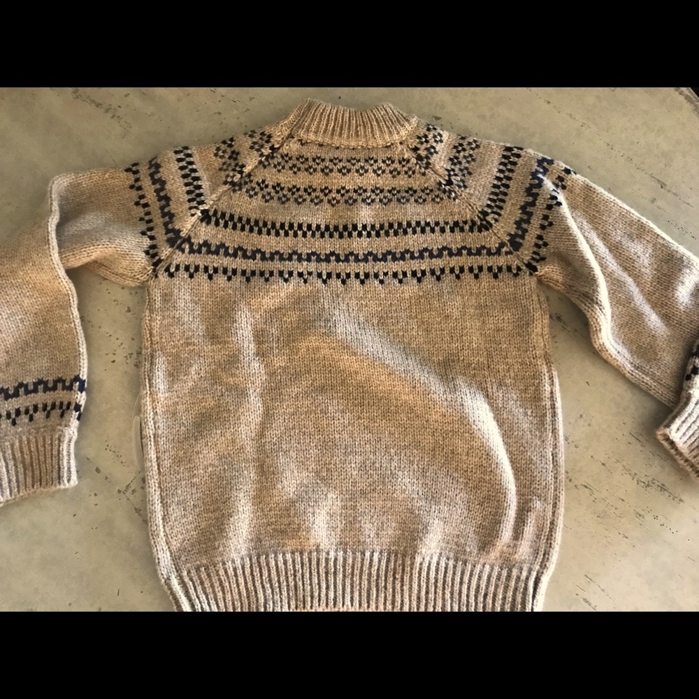 Woman’s knitted stylish sweater